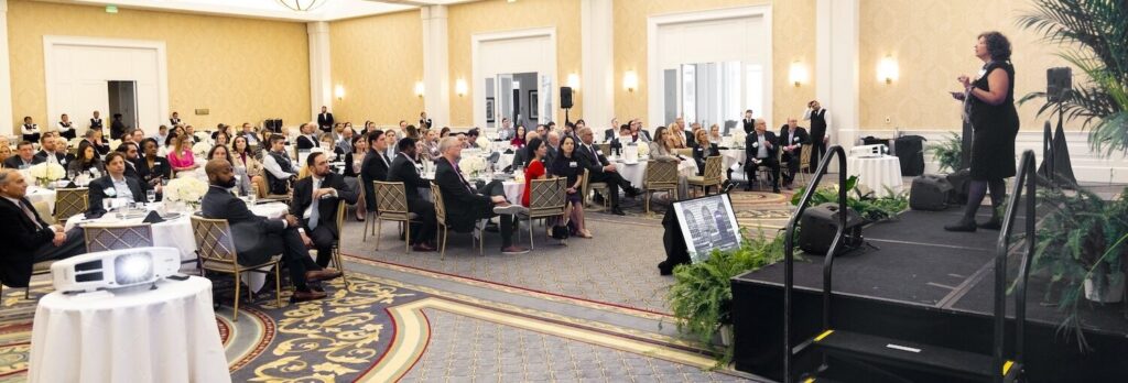 A photo of Susan speaking about wealth legacy